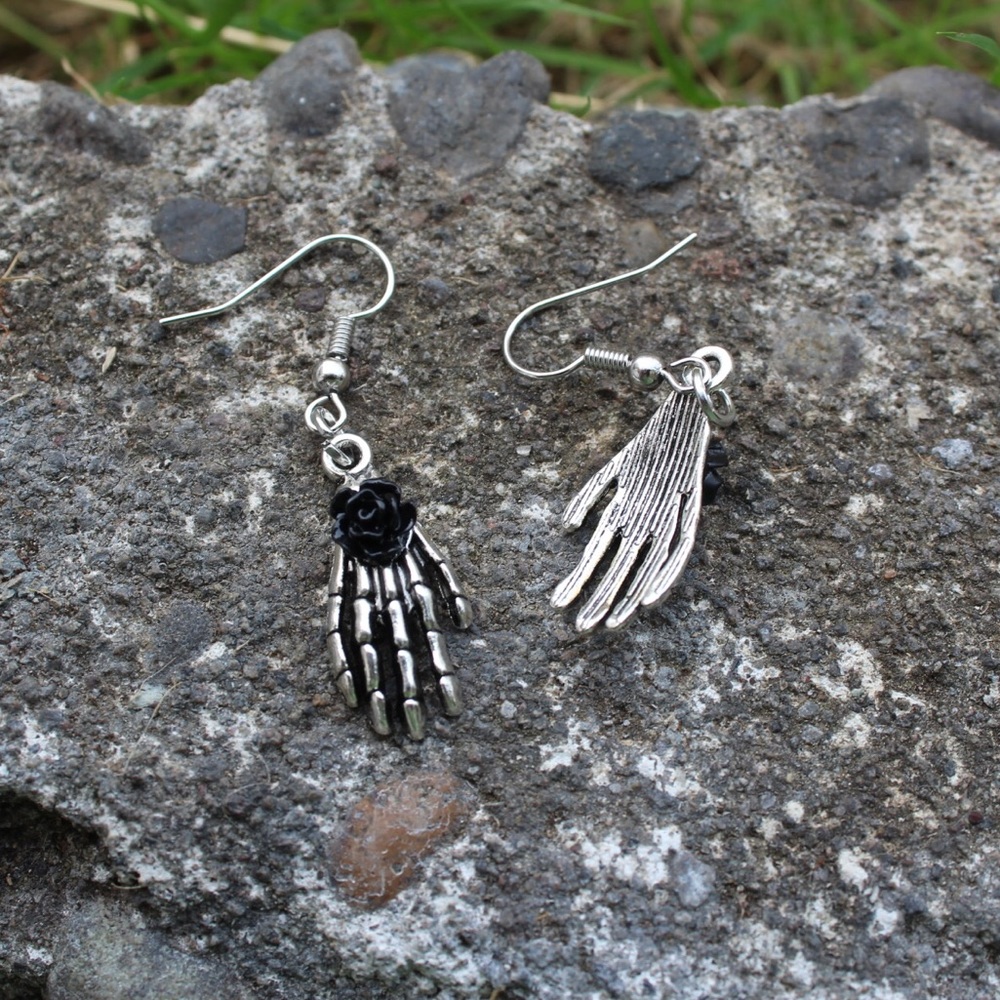 silver skeleton hand earrings